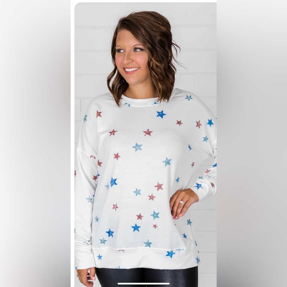 NWOT Pink Lily White Sweatshirt with Red and Blue Star Print